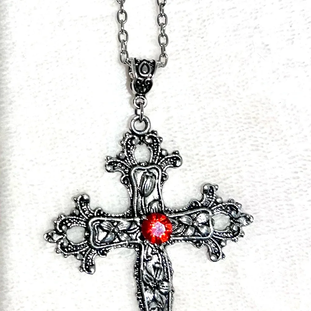 Silver Toned Cross Pendant with Red Gemstone